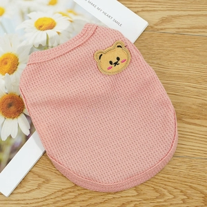 Detailed view of pink waffle knit pet vest featuring a cute bear embroidery patch