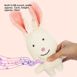 White rabbit squeaky dog toy made of corn fleece with internal BB squeaker 18cm