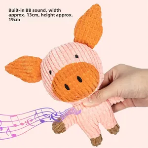 Pink corduroy pig plush dog toy with squeaker, size detail 13cm by 19cm shown