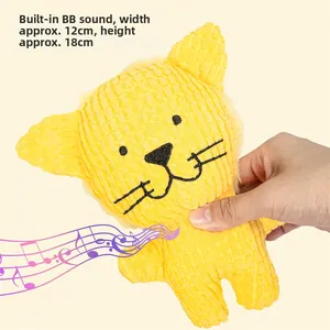 Detail showing the built-in squeaker in the 12x18cm yellow cat plush pet chew toy