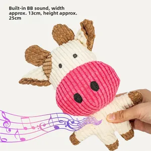 Detail of squeaky cow plush toy made of durable corduroy fabric for pets with sound feature