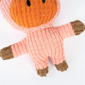 Macro detail of pink corduroy animal plush toy showing durable textured striped fabric