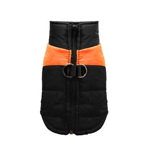 Detail of dog puffer vest with dual metal D-rings and front zipper closure on quilted fabric