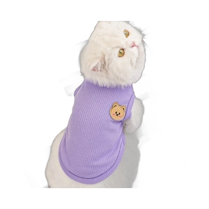 Light purple waffle knit dog vest with cute bear embroidery shown on a cat