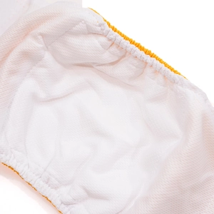 Detail of waterproof dog belly band with breathable mesh lining and elastic orange edges