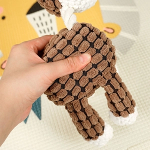 Plush giraffe dog chew toy with textured fabric and white cotton rope detail