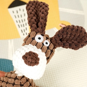 Brown pineapple texture plush dog toy with long ears for interactive teeth cleaning
