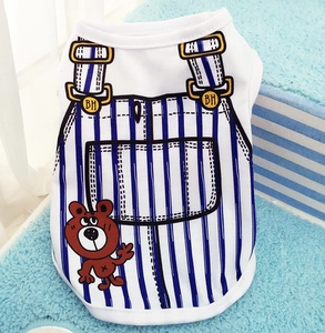Detail of pet fleece vest featuring blue striped overalls print and cute bear illustration