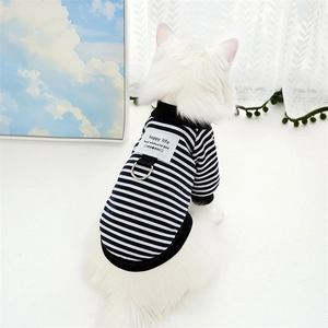Close-up of blue and white striped pet sweater with metal D-ring and happy life patch