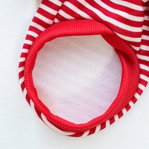 Close-up of pet striped sweater showing the warm fleece lining and elastic red neckline