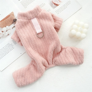 Close-up of pink coral fleece pet jumpsuit with texture details and metal D-ring attachment