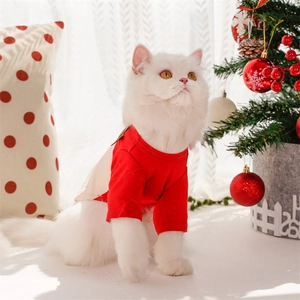 Festive Santa dog costume for small pets made of comfortable red knitted cotton fabric