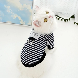 Navy striped pet sweater with D-ring harness attachment and happy life patch