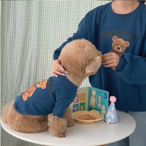 Detail of navy blue fleece sweatshirt with teddy bear print for pets and owners