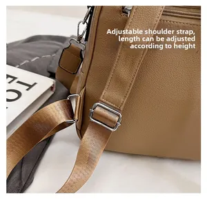 Detail of adjustable brown leather strap with silver buckle and durable fabric lining