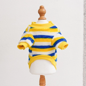 Detail of striped pet sweater with yellow ribbed cuffs and soft fleece texture