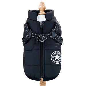 Detail of black insulated dog vest with integrated harness and durable metal D-rings