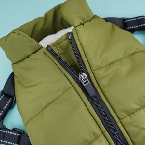 Detailed view of dog winter vest with reflective nylon straps and smooth metal zipper