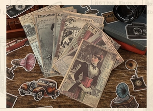 Detailed view of vintage aesthetic paper stickers featuring retro portraits and cameras