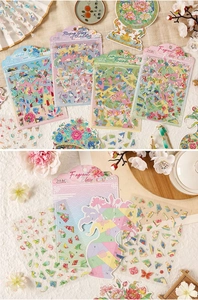 Detail of vintage Chinese style puzzle stickers with lotus and cloud patterns for journaling