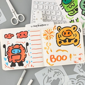 Creative doodle stencil kit for DIY journals featuring cartoon tiger and monster patterns