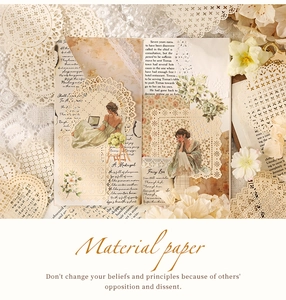 Close-up of vintage hollow lace stickers and literary material paper for journaling
