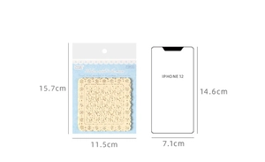Detailed view of hollow lace paper stickers in packaging with size reference