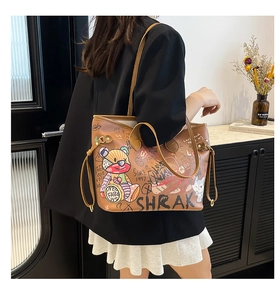 Detail of a brown tote bag with colorful graffiti art and street style illustrations