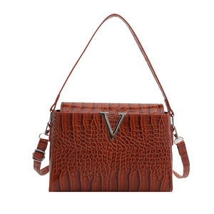 Brown crocodile embossed top handle bag with silver V buckle and crossbody strap