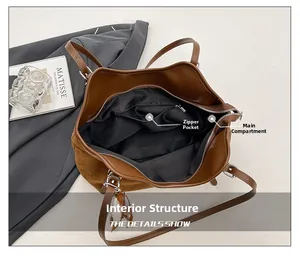 Detailed interior of large tote bag showing main compartment and zippered inner pocket