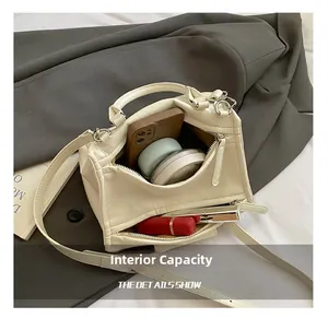 Spacious interior of beige tote bag showing room for phone, lipstick and cosmetics