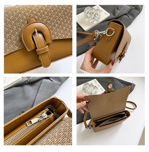 Detail view of tan leather crossbody bag with woven flap and interior zipper compartments