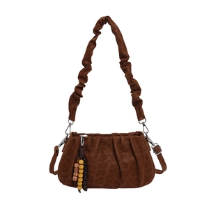 Retro brown leopard print shoulder bag with pleated strap and beaded charm accent