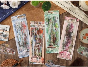 Close-up of four seasonal Chinese style PET stickers with ancient landscapes and flowers