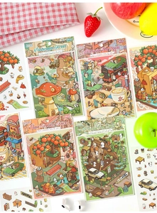Macro detail of hand-drawn 3D scene stickers for DIY scrapbooking and creative journals
