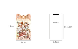 Detailed product size comparison of cartoon cat sports stickers against iPhone 12 frame