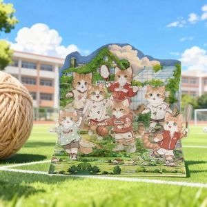 Cartoon orange cat acrylic stand set with sports themes in a sunny outdoor setting