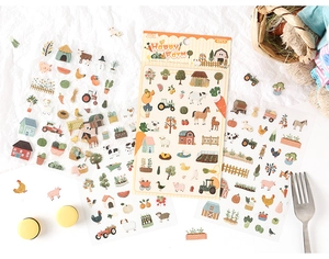 Detail view of 4-piece happy farm stickers set with animal and tractor illustrations
