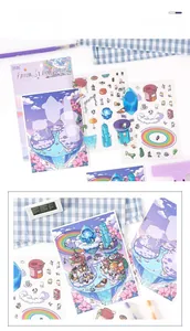 Macro shot of 3-piece Oasis Journey DIY 3D miniature scene stickers in purple and blue