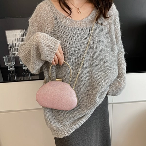 Pink glitter evening box bag with golden ring handle and chain strap for women