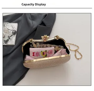 Capacity display of champagne gold glitter clutch bag with elegant petal diamond clasp