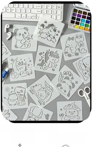 Macro shot of 12 animal painting stencils including pandas and unicorns on a desk