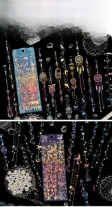 Detailed view of laser butterfly and moon stickers for scrapbooking with gold foil texture