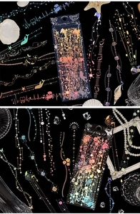 Detailed view of silver laser stickers with ocean whale and floral motifs for journaling