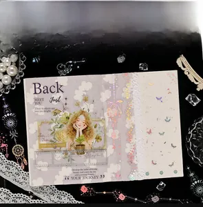 Close-up of holographic gold foil stickers featuring butterflies and floral designs