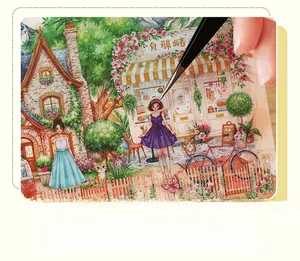 Macro view of DIY process placing stickers on a 3D dreamy miniature house scenery