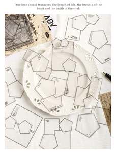 Macro shot of minimalist geometric frame stickers in clear PET material for journaling