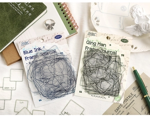 Macro shot of vintage PET journal stickers with elegant blue ink frame designs