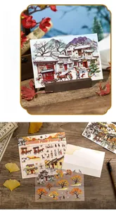 Macro shot of 3D PET stickers and postcards with traditional Chinese architecture and figures