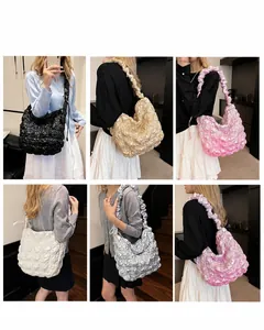 Grid view showing pleated cloud tote bags in metallic black, gold, pink, white, and silver